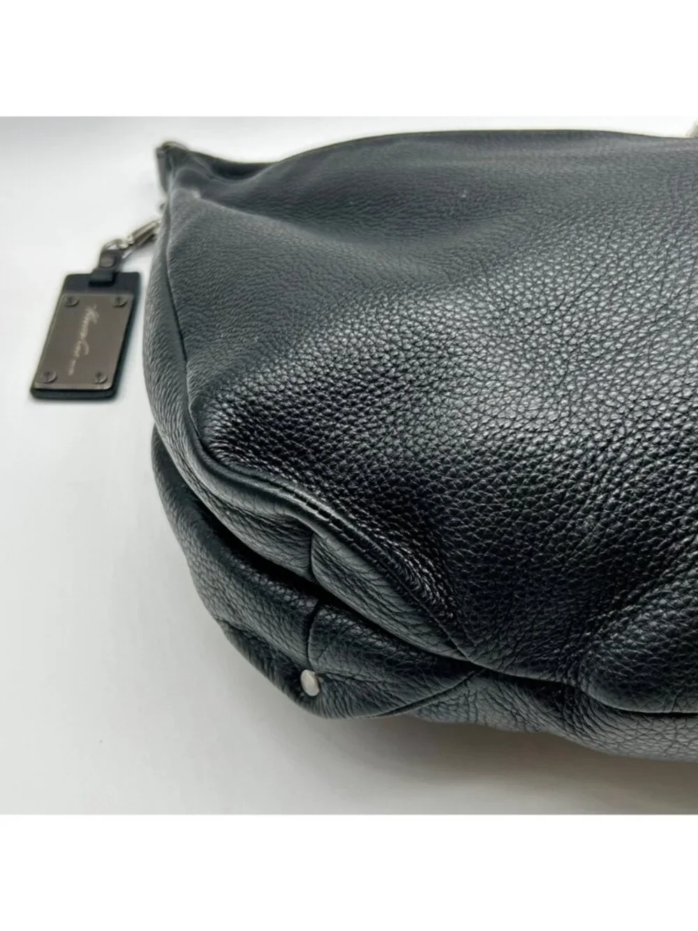 Kenneth Cole chic versatile